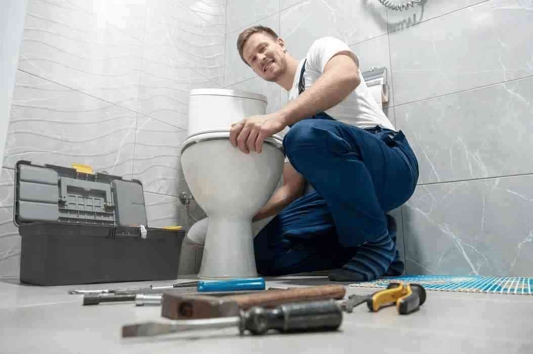 Toilet bowl repair and installation work in a Singapore home